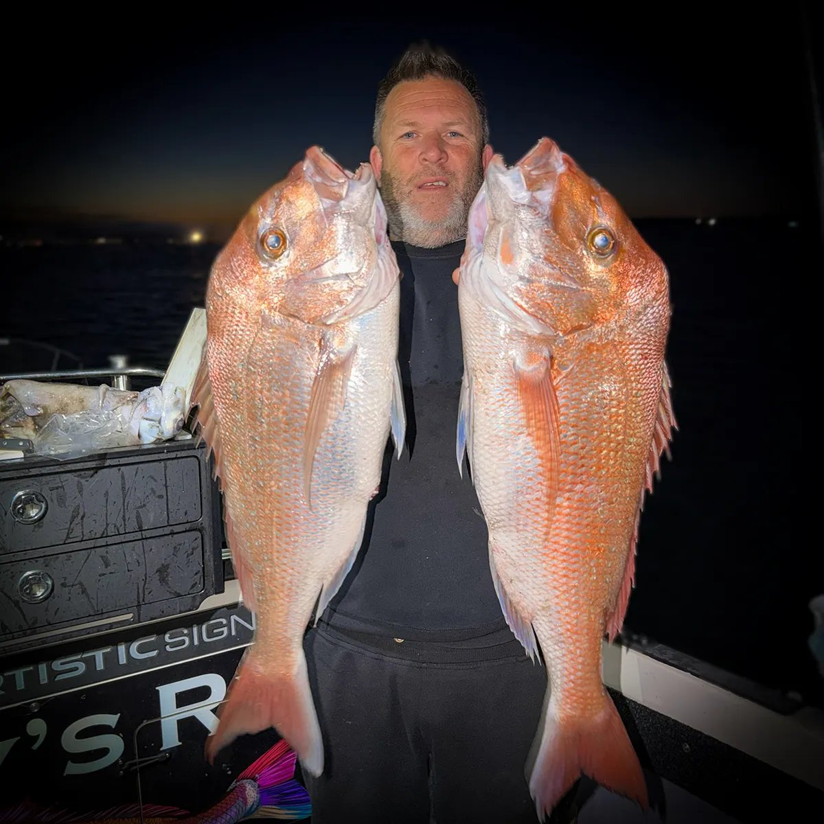 Reedy holding two trophy snapper landed in Port Phillip Bay on the Reedy's Rigs Alpha Rig pre-tied snapper rig