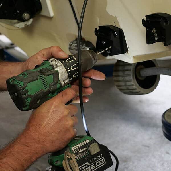 marine transducer used for sonar showing typical wear over time from heavy fishing use