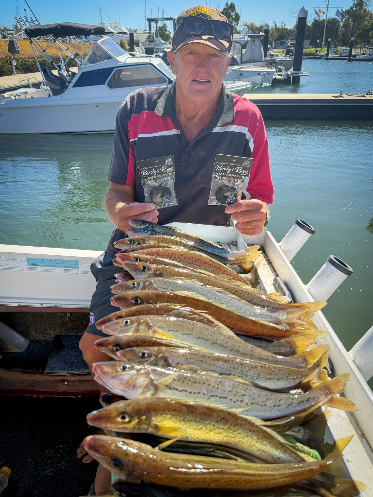 Reedy's Rigs customer with two Tinganoster whiting rig packets and a boat-caught King George Whiting catch at marina